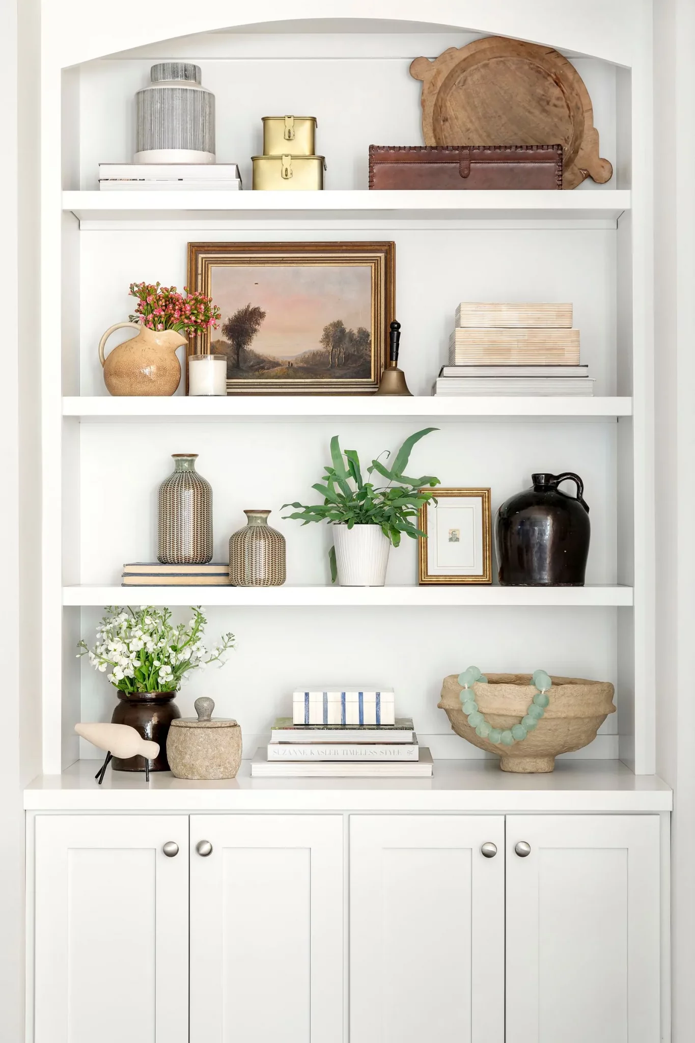Plants and flowers on a bookshelf 1365x2048 1